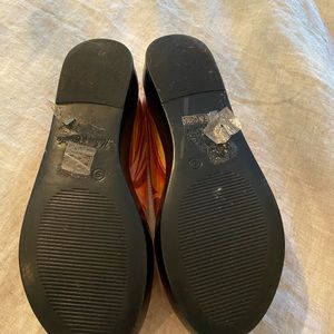 Pair of Florida style slide on sandles!!  Rarely worn.